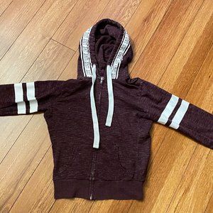 Burgundy sweater with white stripes